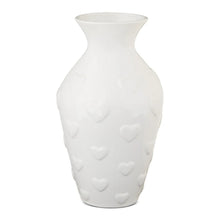 White ceramic heart-pattern vase with flared opening