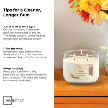 Vanilla three-wick glass jar candle with cream wax and centered label inside jar
