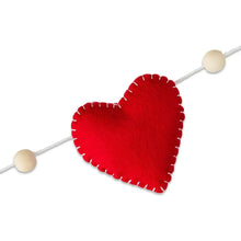 Felt red heart on white cord with wooden bead ends