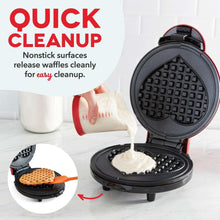 Heart waffle maker with open lid, batter pour over grid heart plate