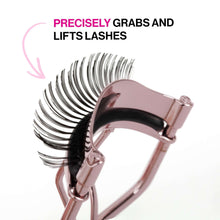 Rose gold eyelash curler with black rubber pad and hinge detail