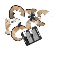 Dual pencil sharpener with pencil shavings around closed unit